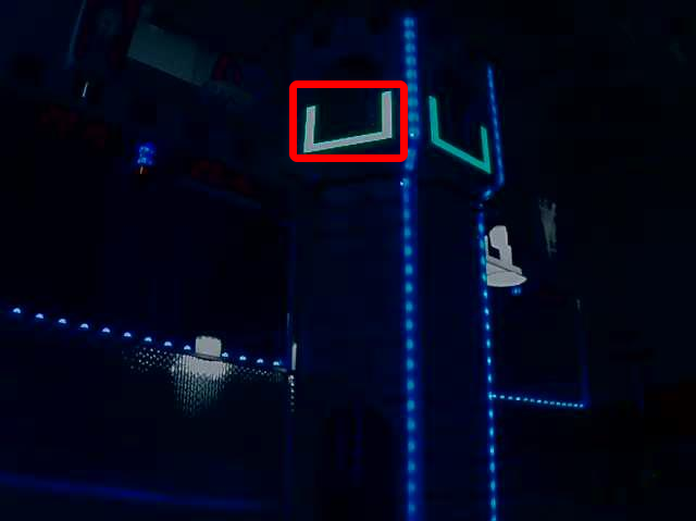 Low brightness picture of the same tower with illuminated retroreflective tape.